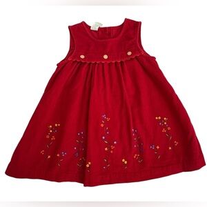 Corduroy red jumper with embroidered flowers